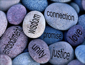 rocks with words such as "wisdom" and "love" printed on them