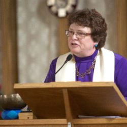 Rev. Cheryl Leshay at the pulpit