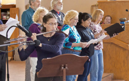 Flutist Mara Pentlarge performs with the UUCW choir