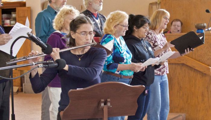 Flutist Mara Pentlarge performs with the UUCW choir