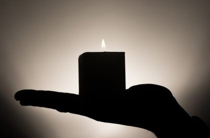 hand holding candle