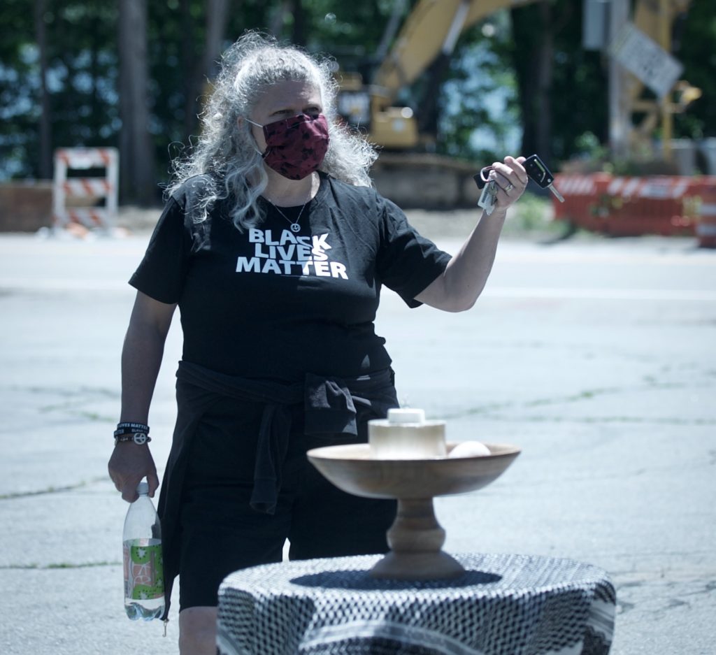 Director of Religious Exploration and Education, Robin Mitzcavitch, directs proceedings for Coming Of Age participants on May 31, 2020.