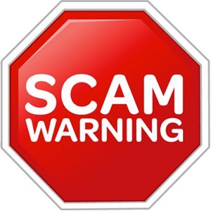 stop sign with "scam alert" text