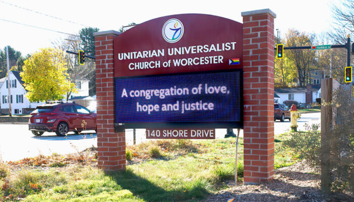 UUCW new Sign Slider UUCW sign with message "a congregation of love, hope and justice"