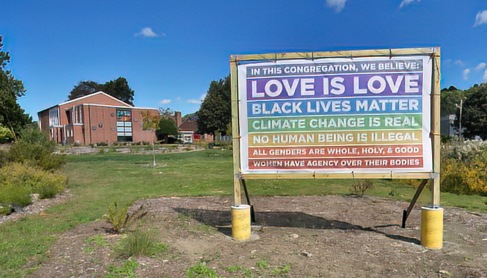 2024 uucw exterior - love is love uucw church exterior showing "love is Love" sign